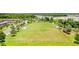 Large community recreation field with a soccer goal, playground, and pavilion, perfect for outdoor activities at 17378 Cruiser Bnd, Land O Lakes, FL 34638