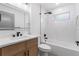 Modern bathroom featuring a sleek vanity and a combined shower and tub at 1800 Loch Haven Ct, Trinity, FL 34655