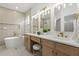 Luxurious bathroom with dual vanity, soaking tub, and elegant fixtures at 1800 Loch Haven Ct, Trinity, FL 34655