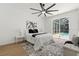 Serene bedroom with patio access, complemented by contemporary decor and natural light at 1800 Loch Haven Ct, Trinity, FL 34655