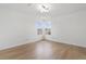 Bedroom with natural light provided by two corner windows at 1800 Loch Haven Ct, Trinity, FL 34655