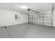 Clean and spacious two car garage with epoxy floor at 1800 Loch Haven Ct, Trinity, FL 34655