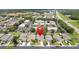 Aerial street view of homes in a well-maintained neighborhood near commercial buildings at 1800 Loch Haven Ct, Trinity, FL 34655