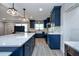 Bright kitchen boasting a center island, updated appliances, and a breakfast bar at 1800 Pine St, Clearwater, FL 33764