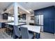 Eat-in kitchen with an island, stainless steel appliances, and ample cabinet space at 1800 Pine St, Clearwater, FL 33764
