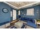 Charming covered patio with cozy seating, a ceiling fan, and stylish decor for a relaxing atmosphere at 1800 Pine St, Clearwater, FL 33764