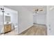 Hallway leading to a remodeled bathroom with modern finishes at 1924 48Th S St, St Petersburg, FL 33711