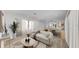 Open-concept living and dining area with modern furnishings and lots of natural light at 1924 48Th S St, St Petersburg, FL 33711
