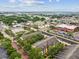 Birds eye view of an apartment complex surrounded by trees at 2010 E Palm Ave # 14303, Tampa, FL 33605