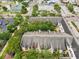 Aerial view of property surrounded by mature trees in a desirable neighborhood at 2010 E Palm Ave # 14303, Tampa, FL 33605