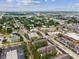 Birds eye view of a residential area near businesses and a community with lots of trees at 2010 E Palm Ave # 14303, Tampa, FL 33605