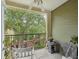 Relaxing balcony with a peaceful view of lush greenery, perfect for enjoying the outdoors at 2010 E Palm Ave # 14303, Tampa, FL 33605
