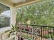 Charming balcony overlooking beautifully landscaped grounds, ideal for enjoying the serene surroundings at 2010 E Palm Ave # 14303, Tampa, FL 33605