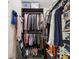 Well-organized closet with shelving and hanging rods for optimal storage at 2010 E Palm Ave # 14303, Tampa, FL 33605