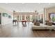 Expansive game room with ample seating, pool table, foosball, and brick accent walls at 2010 E Palm Ave # 14303, Tampa, FL 33605