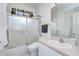 This bathroom features a shower-tub combo and vanity sink at 2226 N Creek Ct, Sun City Center, FL 33573
