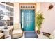 Welcoming front porch with comfortable seating and decorative accents, great for relaxation at 2226 N Creek Ct, Sun City Center, FL 33573