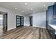 Open living room with hardwood floors, and well lit by recessed lights and natural light at 3319 Bayshore Ne Blvd, St Petersburg, FL 33703
