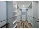 Well-organized walk-in closet featuring shelving and drawers at 3319 Bayshore Ne Blvd, St Petersburg, FL 33703