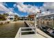 View from the dock to a waterfront property with neighboring homes nearby at 3319 Bayshore Ne Blvd, St Petersburg, FL 33703