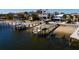 Waterfront homes featuring docks and piers on a sunny day at 3319 Bayshore Ne Blvd, St Petersburg, FL 33703