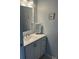 Clean bathroom with modern vanity, mirror, and fixtures at 3665 Country Pointe Pl, Palm Harbor, FL 34684