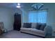 Cozy room with sofa and chair at 3665 Country Pointe Pl, Palm Harbor, FL 34684