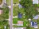 A bird's eye view of the home in a neighborhood setting at 4220 E Regnas Ave, Tampa, FL 33617