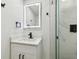 Nicely updated bathroom with glass shower and vanity at 4220 E Regnas Ave, Tampa, FL 33617