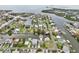 Stunning aerial view of a waterfront home in a picturesque canal community at 4503 Jacona Dr, Hernando Beach, FL 34607