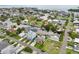 A beautiful aerial view of a waterfront community with canals, boats, and well-maintained homes at 4503 Jacona Dr, Hernando Beach, FL 34607