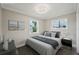 Bright bedroom featuring two windows, and neutral paint at 4503 Jacona Dr, Hernando Beach, FL 34607