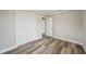 Neutral colored bedroom with hardwood flooring and closet at 4503 Jacona Dr, Hernando Beach, FL 34607