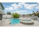 Swimming pool and hot tub with a view of the waterfront at 4503 Jacona Dr, Hernando Beach, FL 34607