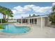 Swimming pool with a built-in hot tub and an enclosed patio area at 4503 Jacona Dr, Hernando Beach, FL 34607