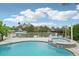 Waterfront home featuring a luxurious pool and spa overlooking serene canal views at 4503 Jacona Dr, Hernando Beach, FL 34607