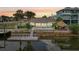 Waterfront home boasts a private dock, tiki hut, and stunning sunset views from the backyard at 4503 Jacona Dr, Hernando Beach, FL 34607