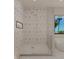 Shower with geometric tiles and a window view at 4535 26Th S Ave, St Petersburg, FL 33711