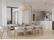 Stylish dining room with seating for eight, flowing into a spacious living area at 4535 26Th S Ave, St Petersburg, FL 33711