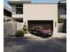 A modern house with a dark brown Porsche parked in front of the two-car garage at 4535 26Th S Ave, St Petersburg, FL 33711