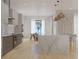 Modern kitchen featuring a large island, barstool seating, and stainless steel appliances at 4535 26Th S Ave, St Petersburg, FL 33711