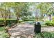 Community basketball court with park benches surrounded by greenery at 4544 Vermillion Sky Dr, Wesley Chapel, FL 33544
