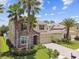 Charming two-story home with a paved driveway and well-manicured lawn at 4544 Vermillion Sky Dr, Wesley Chapel, FL 33544