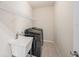 Utility room with sink, wire shelving, and washer and dryer at 5027 Autumn Ridge Dr, Wesley Chapel, FL 33545