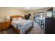 Comfortable bedroom with a walkout and an exercise machine at 512 Crystal Grove Blvd, Lutz, FL 33548
