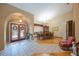 Inviting dining area with wood floors, chandelier, and adjacent living spaces for entertaining at 512 Crystal Grove Blvd, Lutz, FL 33548