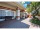 Charming entryway with brick flooring, decorative columns, and ample space for seating at 512 Crystal Grove Blvd, Lutz, FL 33548
