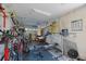 A spacious garage with workout equipment, bikes, and room for projects at 512 Crystal Grove Blvd, Lutz, FL 33548