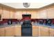 Bright eat-in kitchen featuring stainless appliances, granite counters, and decorative touches at 512 Crystal Grove Blvd, Lutz, FL 33548