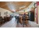 Bright, open kitchen with an island, bar seating, and modern appliances at 512 Crystal Grove Blvd, Lutz, FL 33548